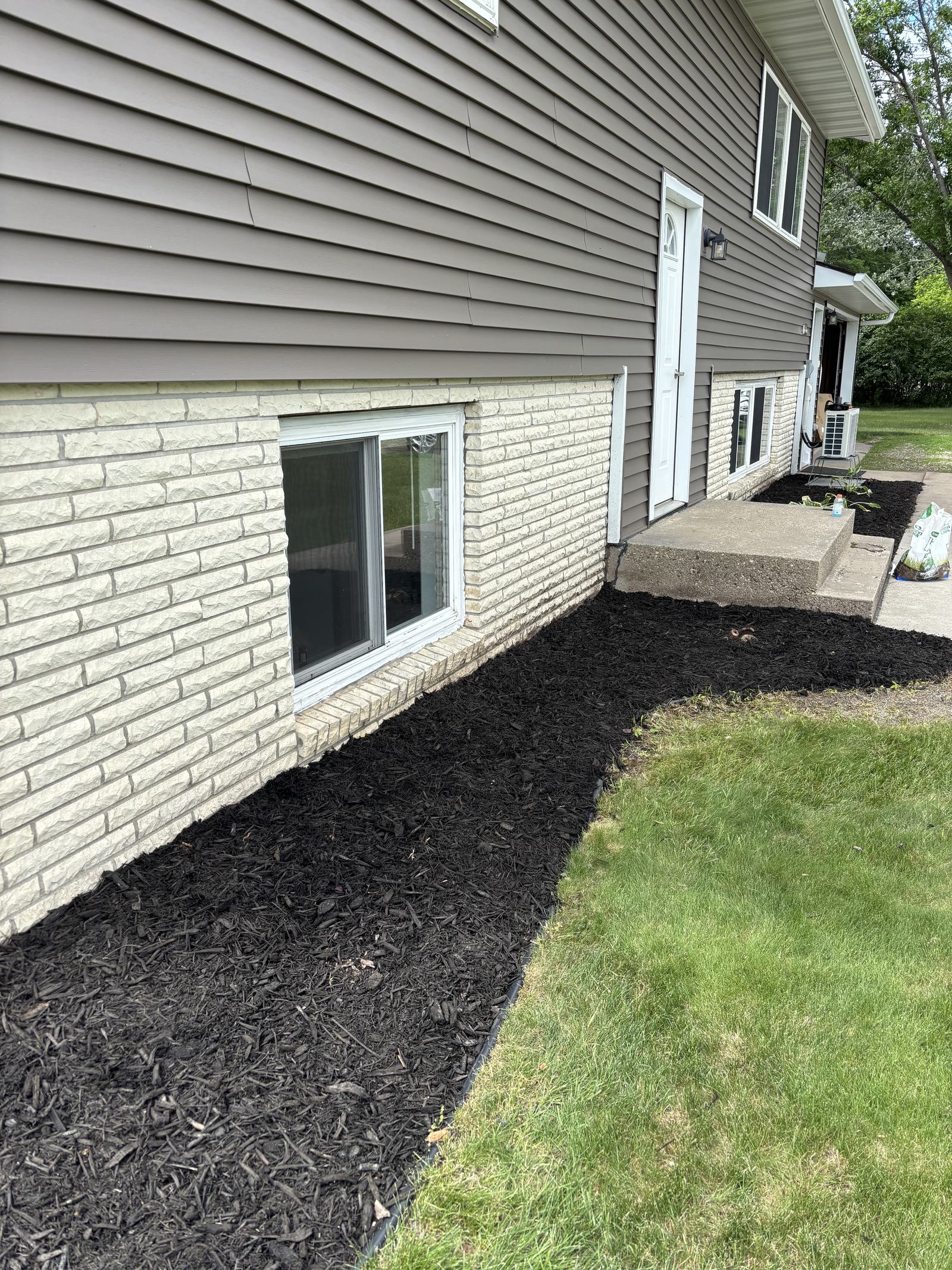 Mulch bed running the length of a home