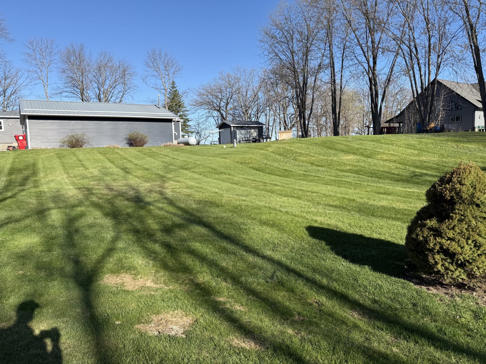 Striped lawn on a lake-country property